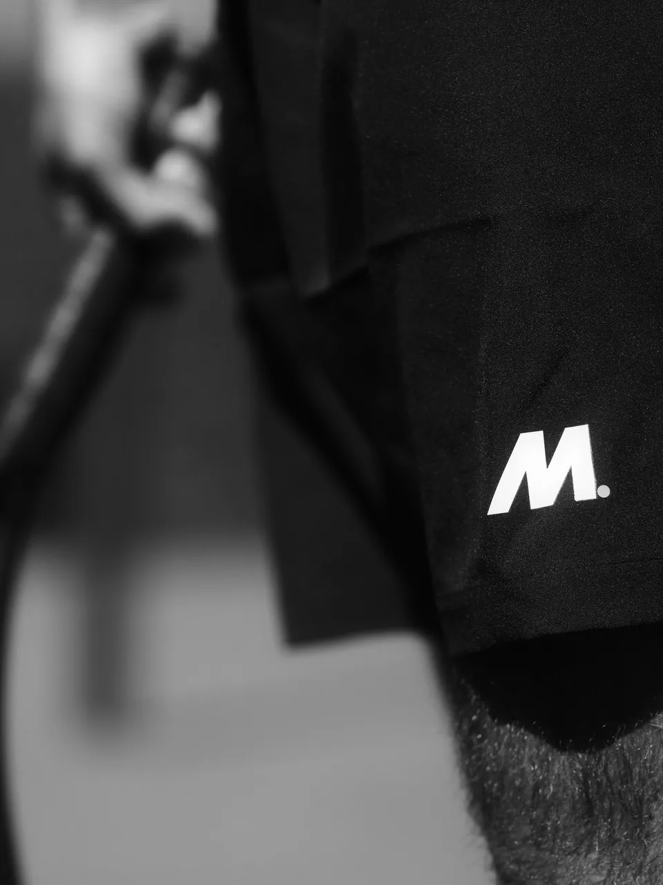 The Mantis M on black fabric, close up