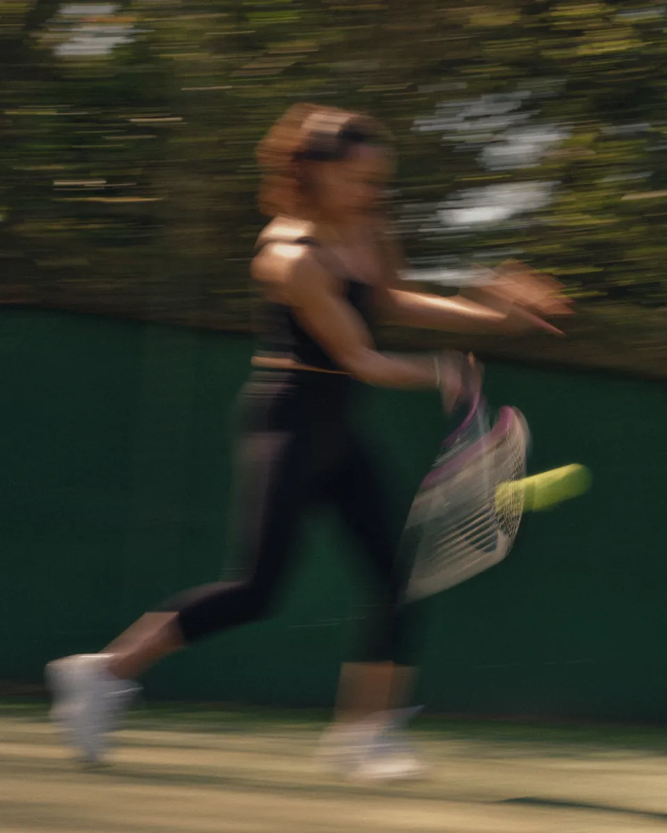 A player running for the ball in a blur